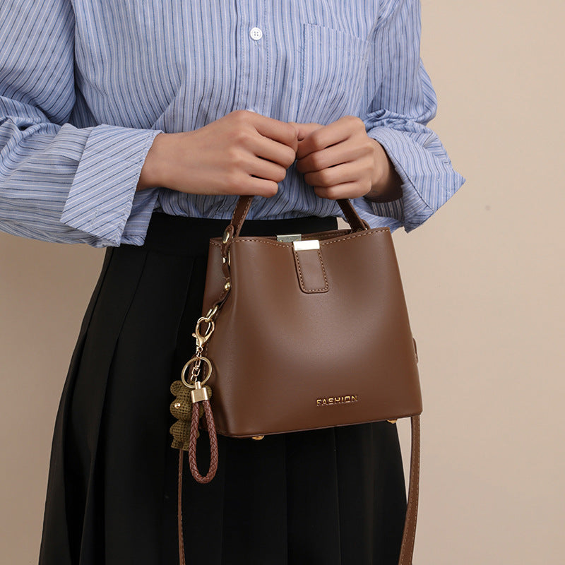 Fashionable autumn handheld bucket bag, simple and elegant messenger bag